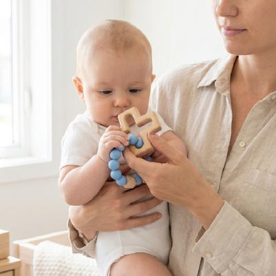 Silicone and Wood Cross Decade Teether - NEW COLOUR RANGE
